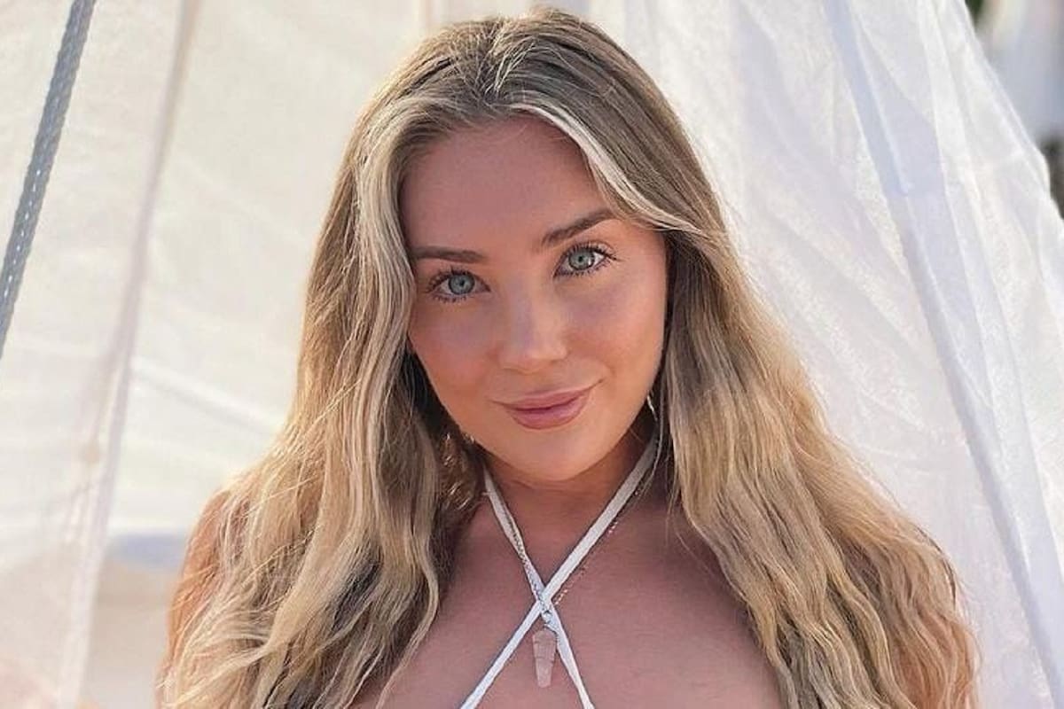 Bethany Lily April deslumbra al modelar sus grandes encantos en traje de baño