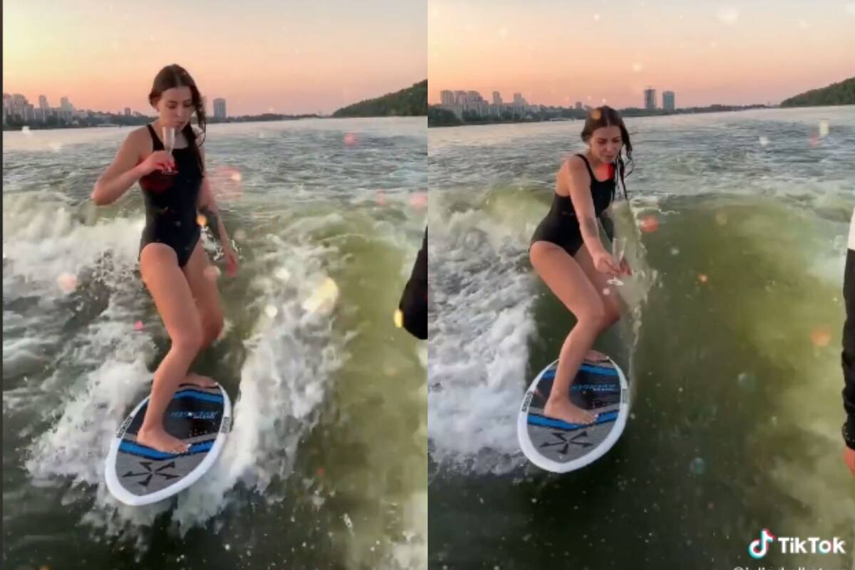 VIDEO: Joven sorprende al beber una copa de champagne mientras surfea