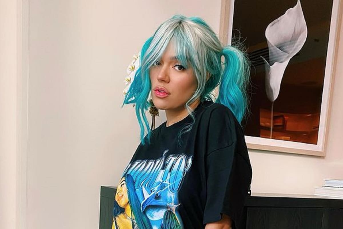 Como una sirena, Karol G endulza la mirada con diminuto bikini desde Bahamas