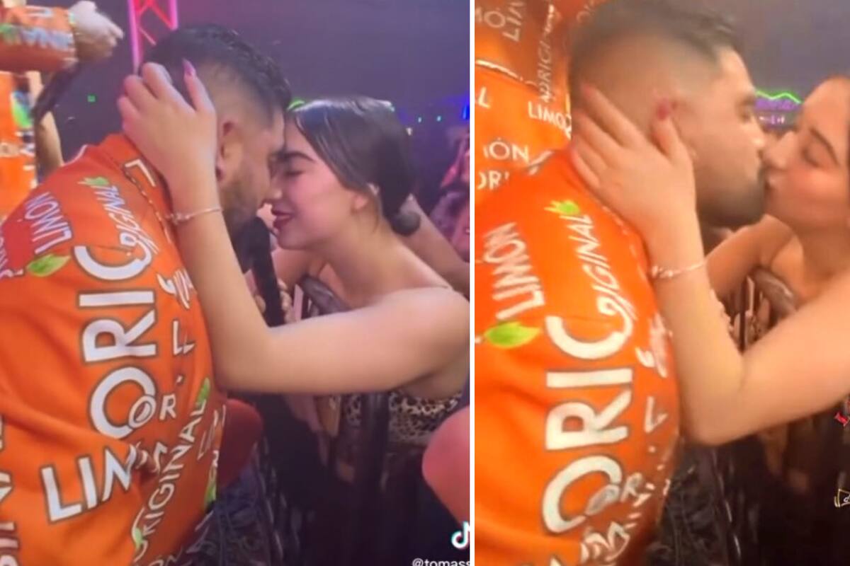 Vocalista de La Original Banda El Limón besa a una fan en pleno concierto