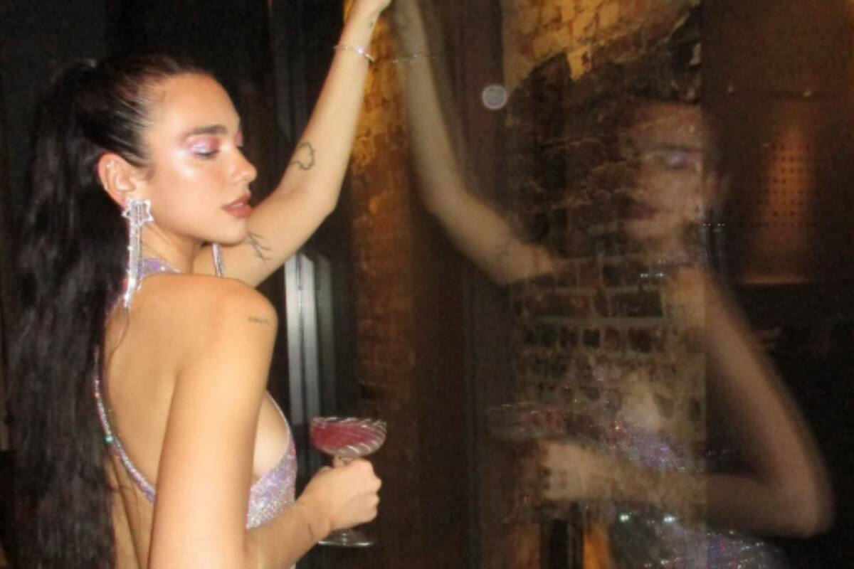 Dua Lipa niega amablemente foto a fan y le da una lección a Bad Bunny