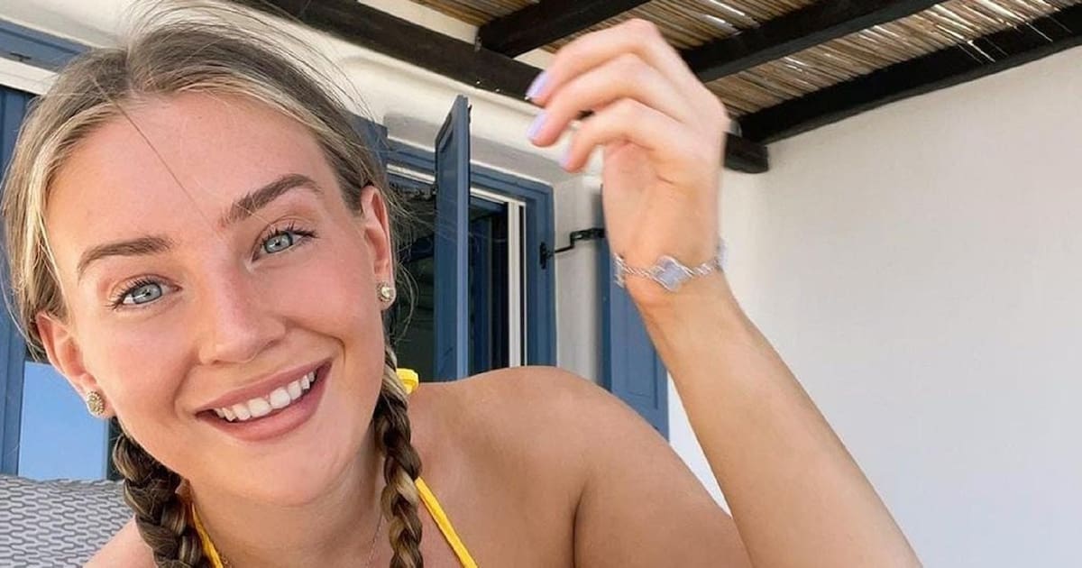 Bethany Lily April deslumbra a sus fans con su escotado vestido blanco