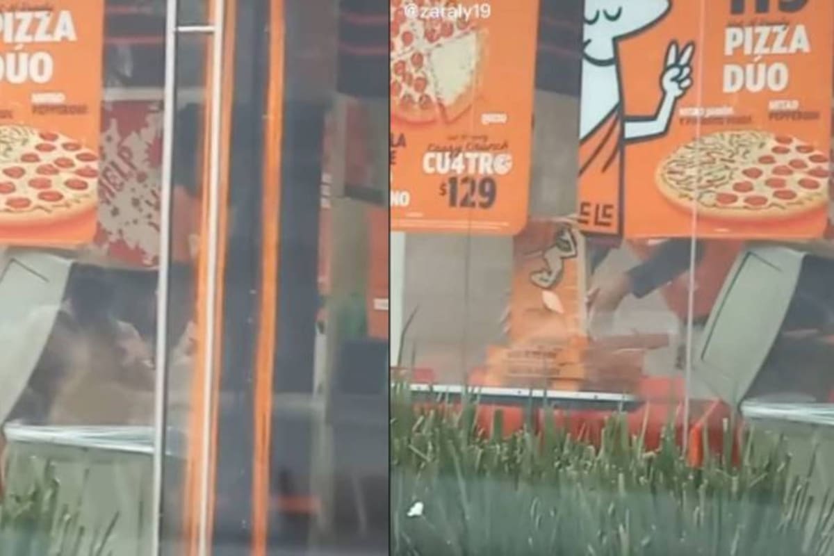 Captan a empleado de famosa pizzería sacando cajas de la basura ¿Las reutilizan?
