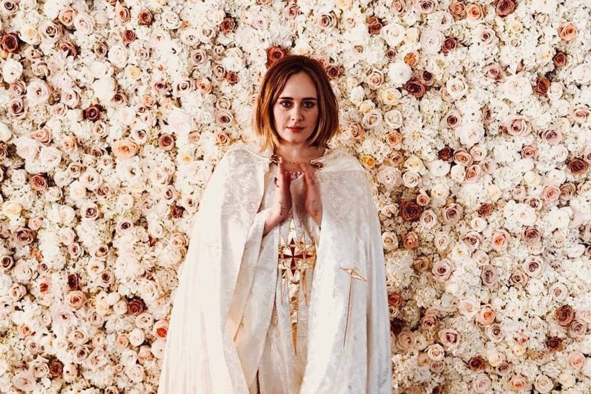 Adele genera polémica al portar la bandera de Jamaica y peinarse con nudos de "bantú"