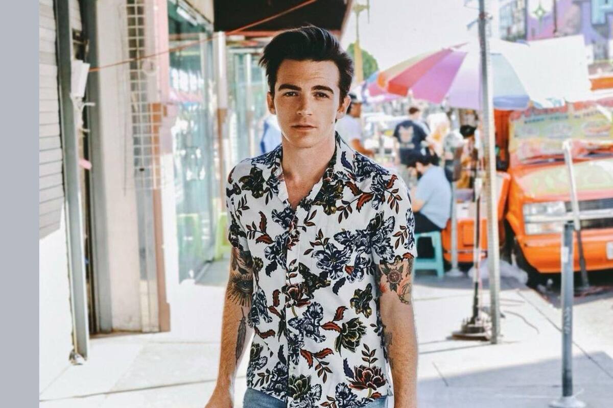 Drake Bell es captado en el Flow Fest comiendo papitas