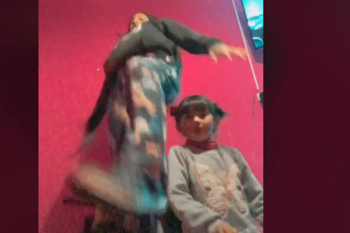 VIDEO: Joven termina en el suelo junto a su hermana por bailar sobre una mesa