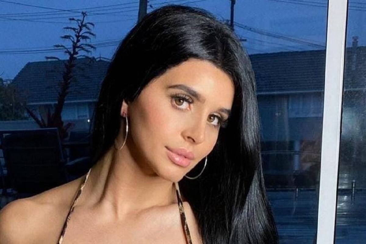 Lily Adrianne luce de espaldas sus curvas en espectacular ropa interior de encaje