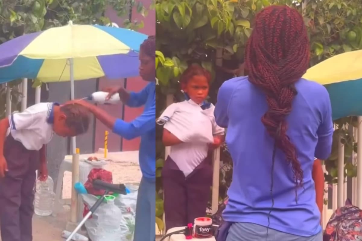 Madre limpiavidrios emociona en internet mientras prepara a sus hijos para la escuela en medio del caos vehicular